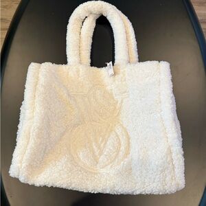 White fuzzy Victoria secret bag